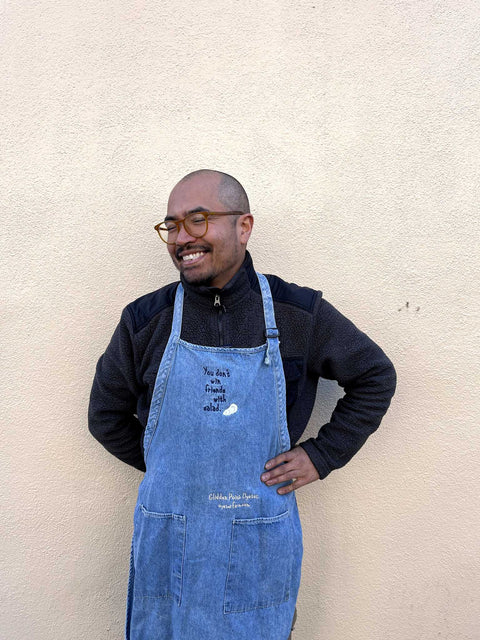 An Oyster Apron That Says "You Don't win Friends With Salad"