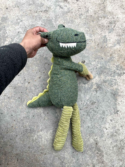Anthropologie Dinosaur Cuddling a Bear