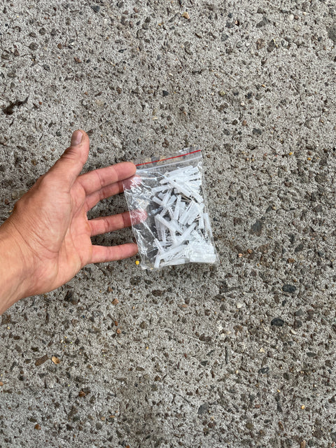 Bunch of Weighted Screws to Hang Some Art