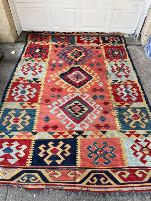 Beautiful Patterned Area Rug w 2 Tears in the Pattern, 110x80”