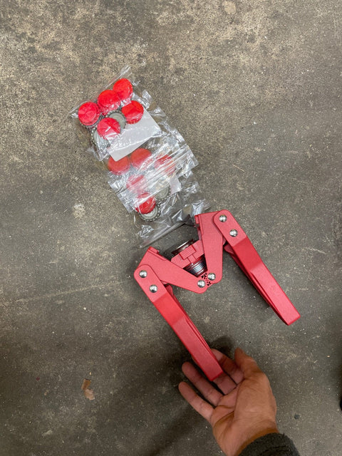 Bottle Capper With Red Caps
