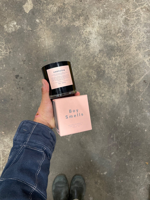 Boy Smells Ambrosia Candle