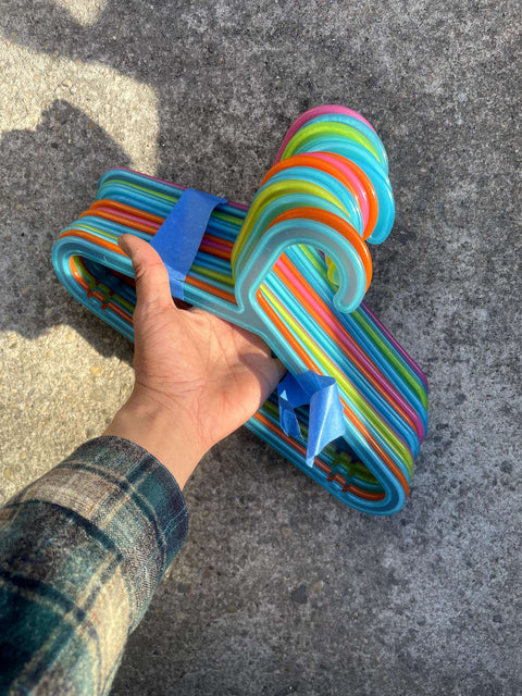 Bunch Of Colorful Plastic Kids Hangers