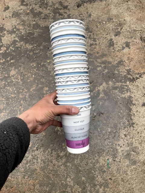 Bunch of Coffee Cups and Lids
