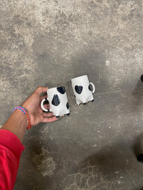 Cute Cow Mugs, one is chipped
