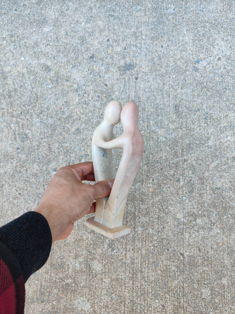 Elegant Stone Embrace Sculpture