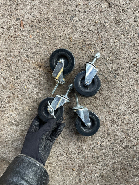 Four Black Caster Wheels