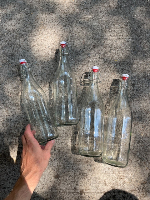 Four Glass Swing Top Bottles