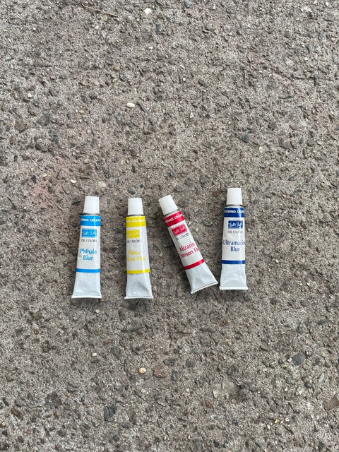 Four Tubes Of Oil Paint