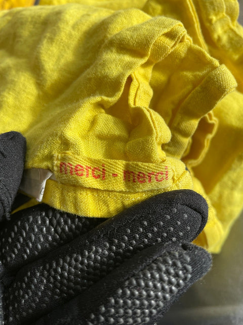 Four Yellow Merci-Merci Linen Napkins