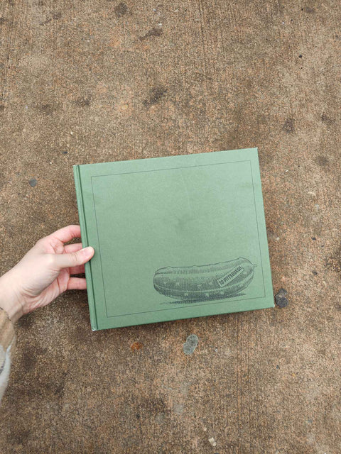 Green Book with Cucumber Illustration