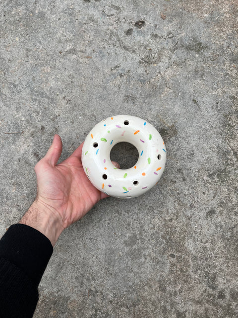 A Ceramic Donut That Could Be Used As An Incenser Holder