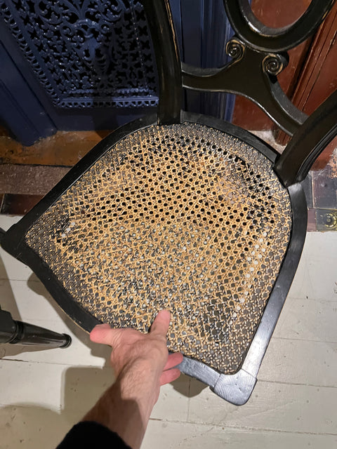 Two Vintage Black Wood Cane Chairs
