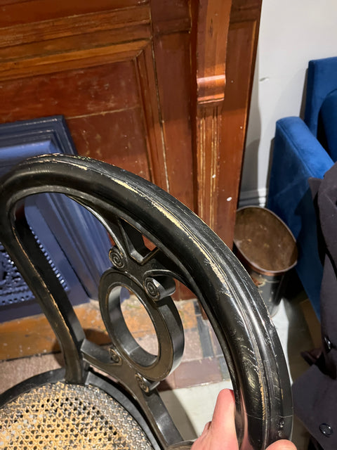 Two Vintage Black Wood Cane Chairs