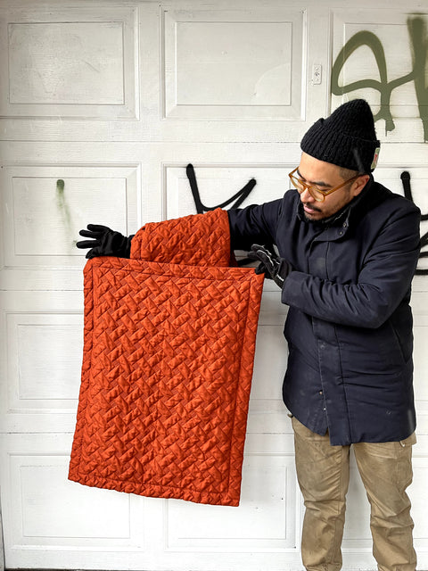 Two Orange Quilted Pillow Covers
