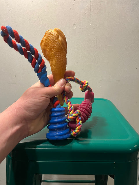 Three brand new dog toys