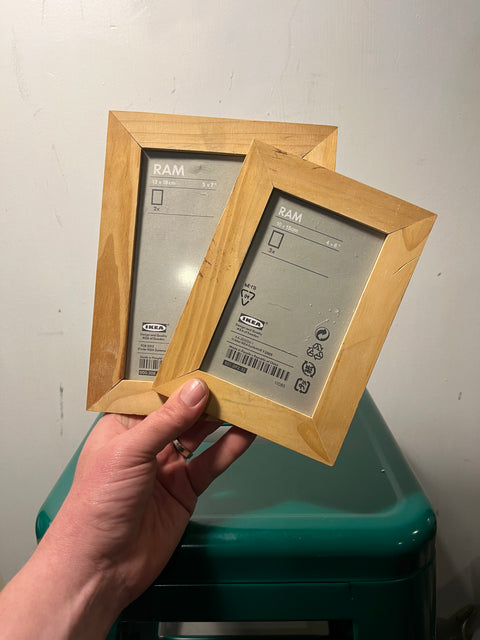 Two small wooden frames