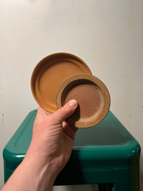 Two Terracotta Plant Bases