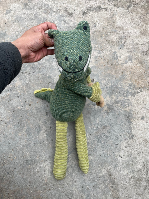 Anthropologie Dinosaur Cuddling a Bear