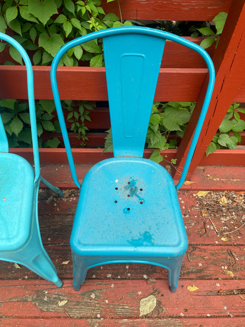 Two Blue Metal Outdoor Chairs