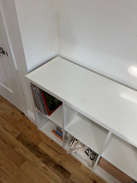 IKEA KALLAX Shelving Unit With Quite A Few Stickers On It, W30xD15xH58”