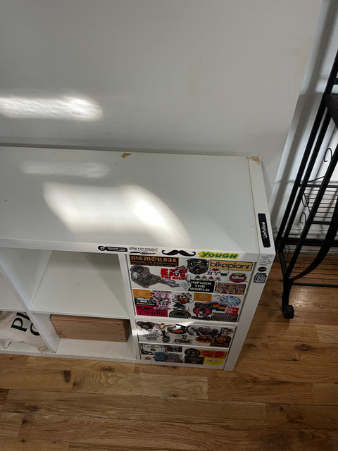 IKEA KALLAX Shelving Unit With Quite A Few Stickers On It, W30xD15xH58”