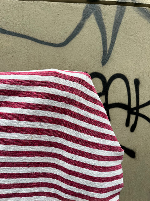 A Pretty Striped Pom-Pom Throw Blanket