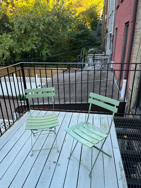 Two Sage Green Folding Bistro Chairs