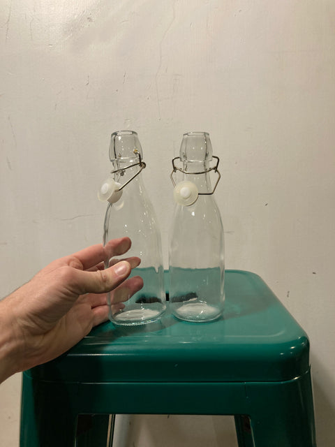 Two Small Glass Bottles