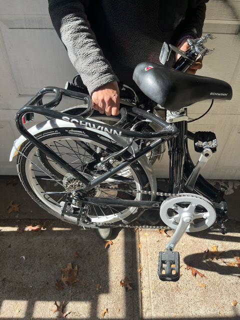 Like New Schwinn Unisex 20 in. 7-Speed Loop Folding Bicycle, Black