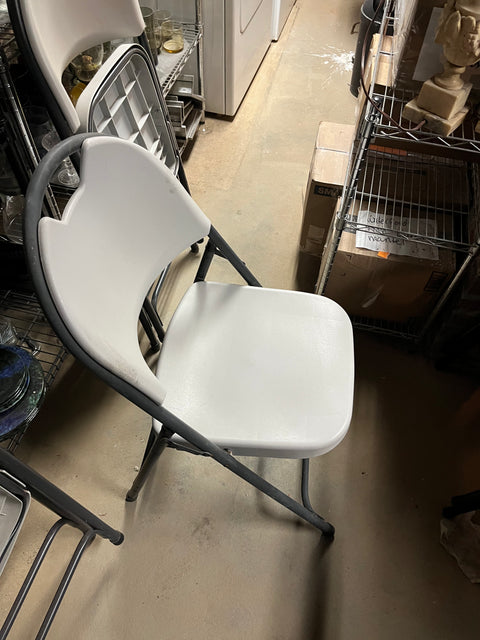 3 White Folding Chairs For Extra Seating