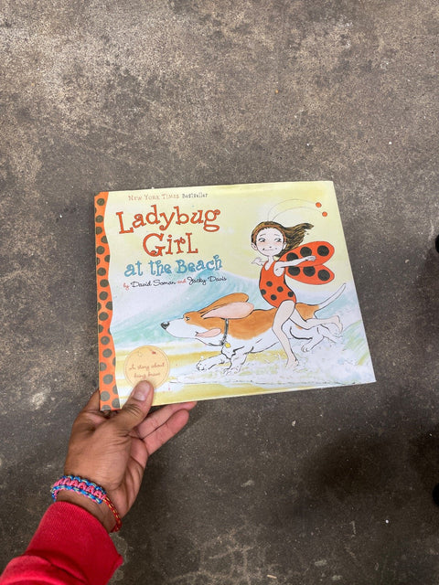 Ladybug Girl At The Beach