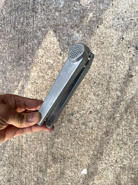 MOMA-esque Metal Garlic Press