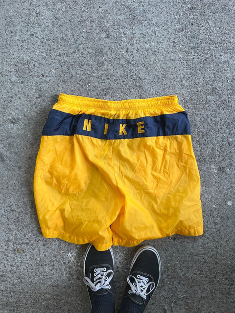 Nike Yellow Shorts That Clearly Say Nike In The Back, Size XL