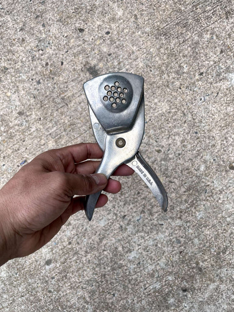 Old School Metal Handheld Juicer