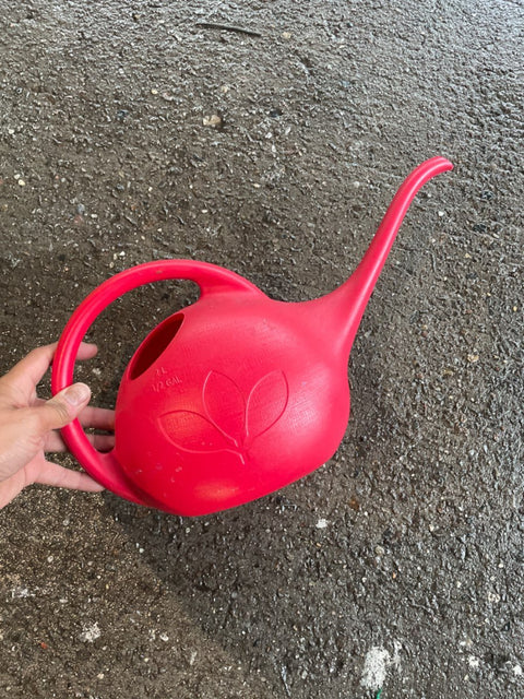 Red Plastic Watering Can