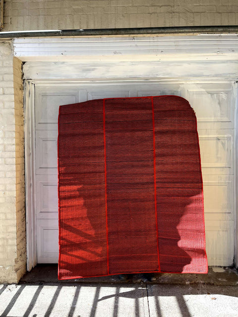 Red Woven Mat For The Beach