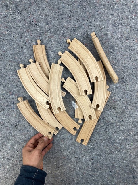 Some Wooden Train Track Pieces