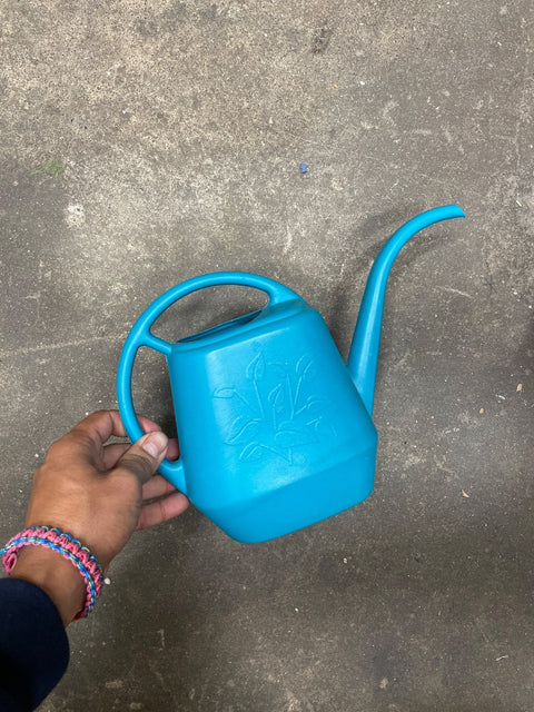 Turquoise Plastic Watering Can