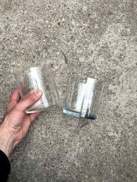 Two Clear Glass Low Vases