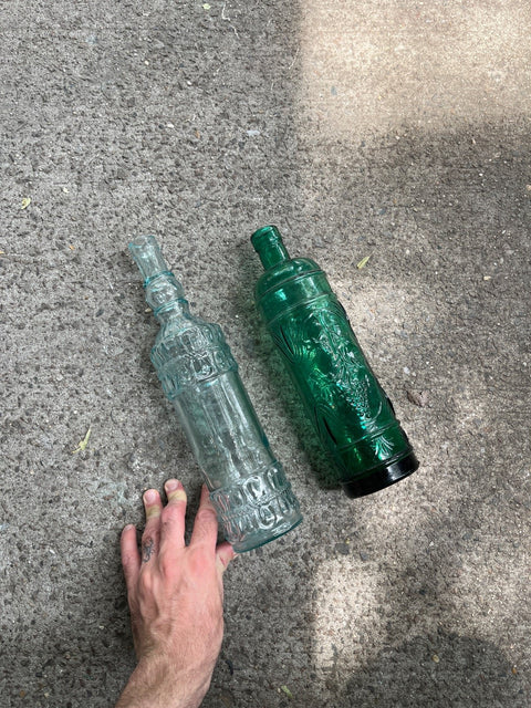Two Decorative Colored Glass Bottles
