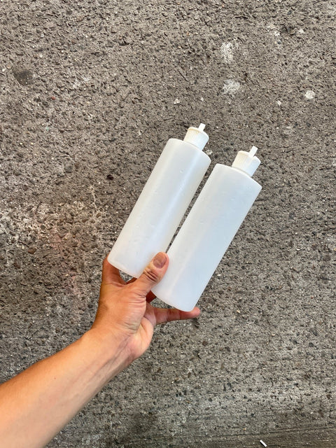Two Empty Squeeze Bottles
