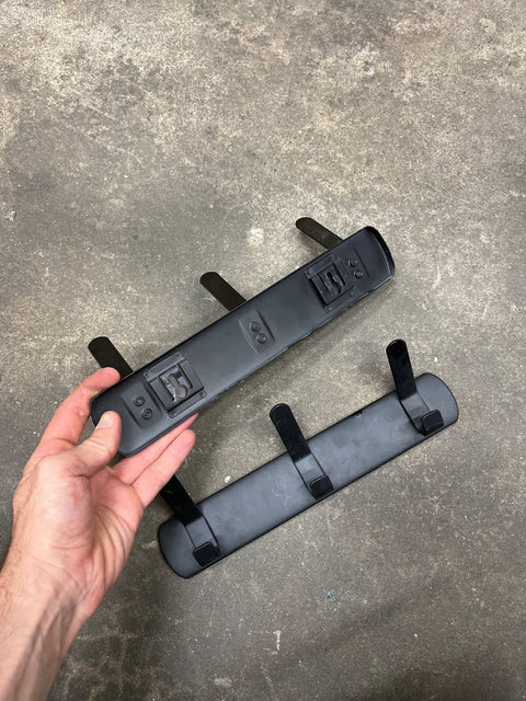 Two Sleek Black Wall Hooks