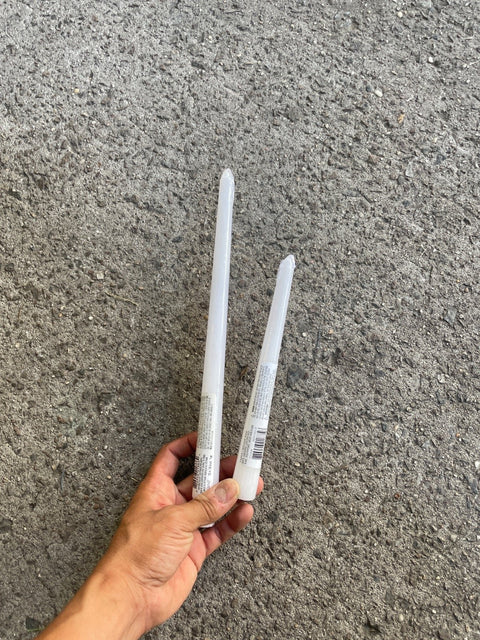 Two White Taper Candles
