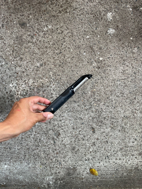 Vegetable Peeler In Hand
