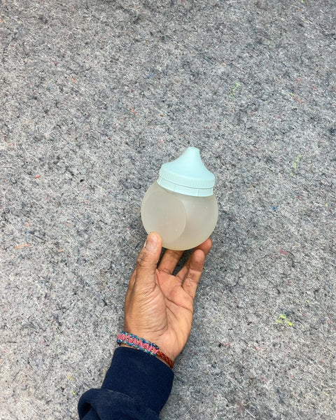 Baby Bottle with Light Blue Nipple