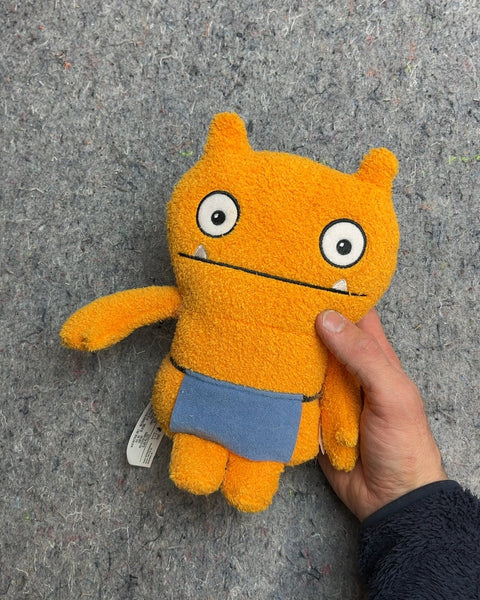 Orange Uglydoll Plush Toy That Looks Like They Are Going To The Onsen