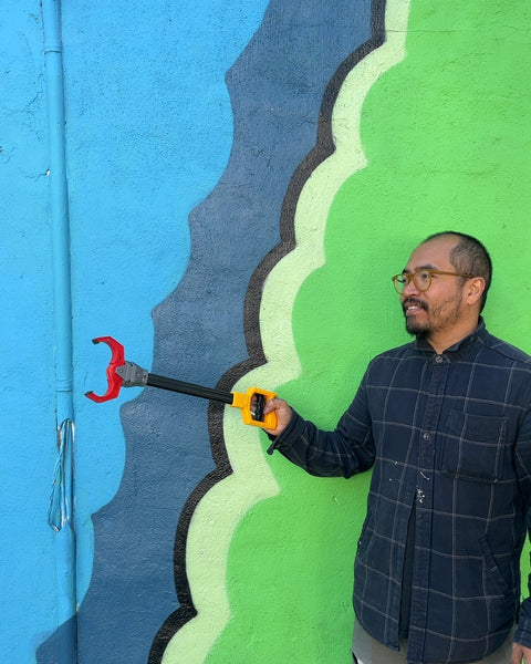 Black and Yellow Grabber Tool For Your Toddler To Be Able To Grab Even More Things Off The Shelves