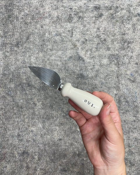 Rae Dunn Oui Ceramic Handle Cheese Knife