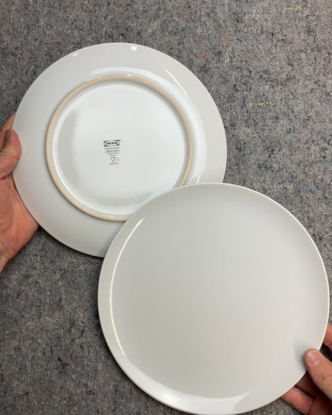Two IKEA White Dinner Plates